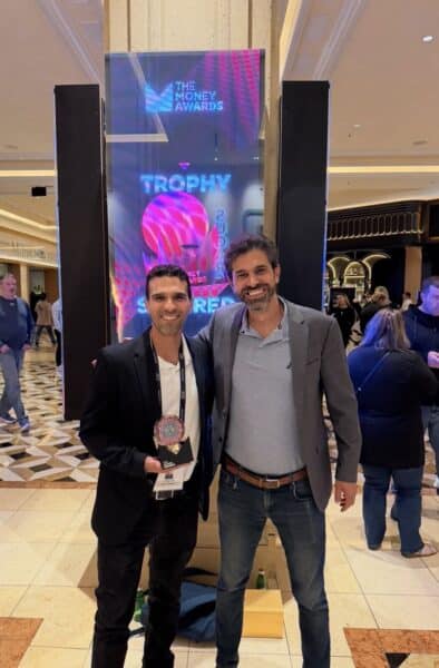 Roenen and Ofir from Justt pick up the silver award at the 2026 Money Awards